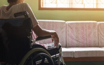 Employee sitting at home after being placed on unpaid medical leave while vacant jobs remain available, illustrating disability accommodation under the ADA