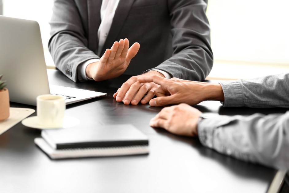 Employee standing up against workplace harassment and forced arbitration.