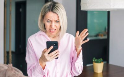 Smartphone screen showing a heated social media rant with shocked emojis
