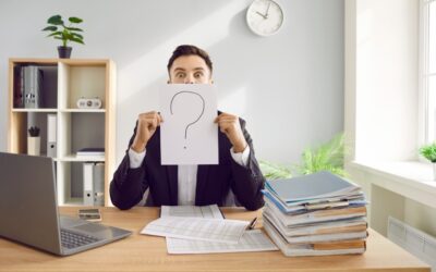 A confused employee looking at a jury verdict form with a red question mark overhead.