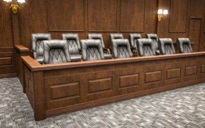 Empty courtroom jury box symbolizing uncertainty after a verdict.