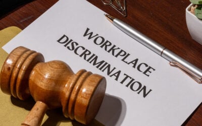 Employee reporting workplace discrimination to HR during a retaliation investigation.