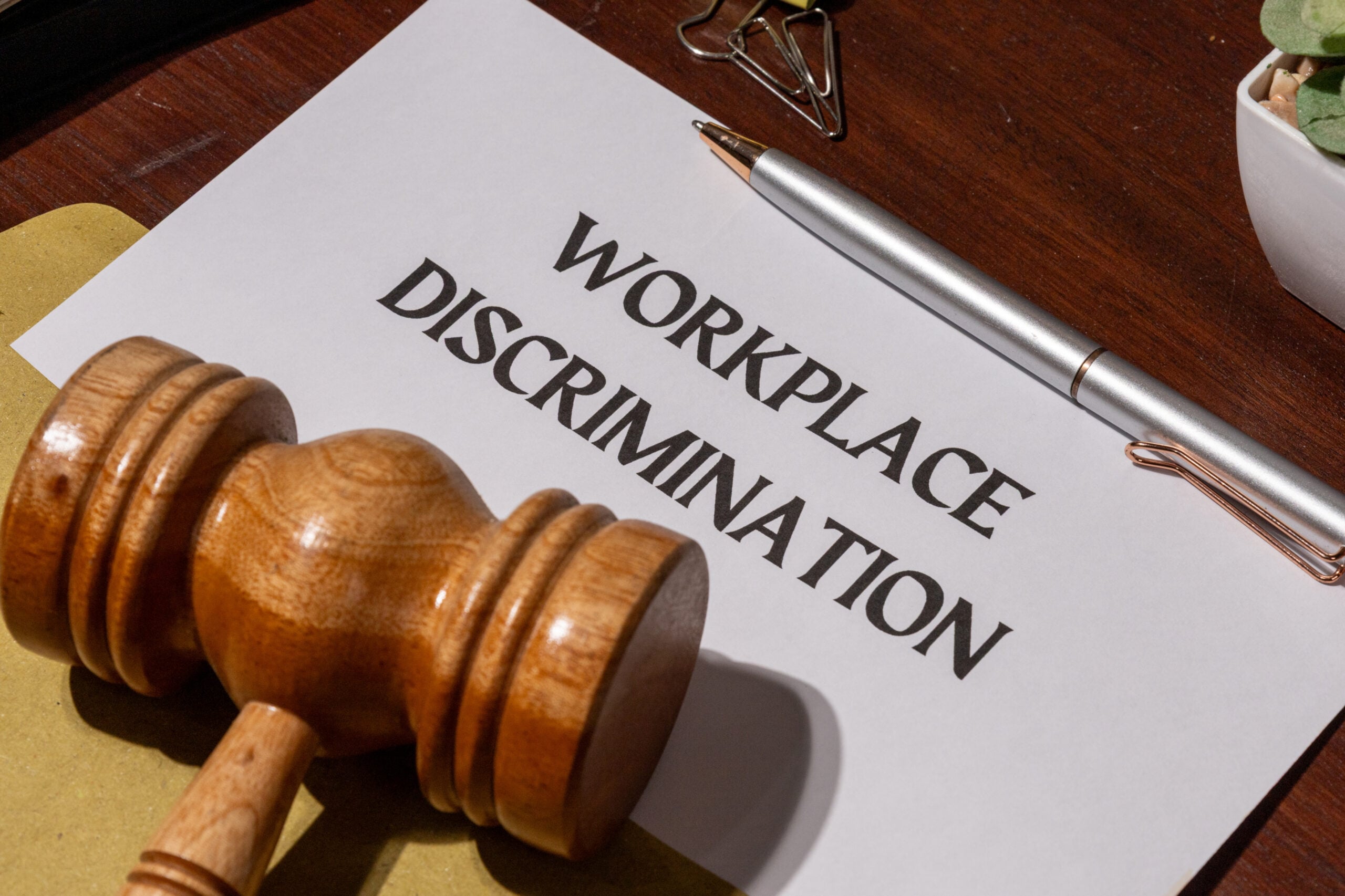 Employee reporting workplace discrimination to HR during a retaliation investigation.