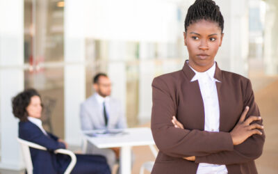 Black employee reacting to offensive racist comment from supervisor at work
