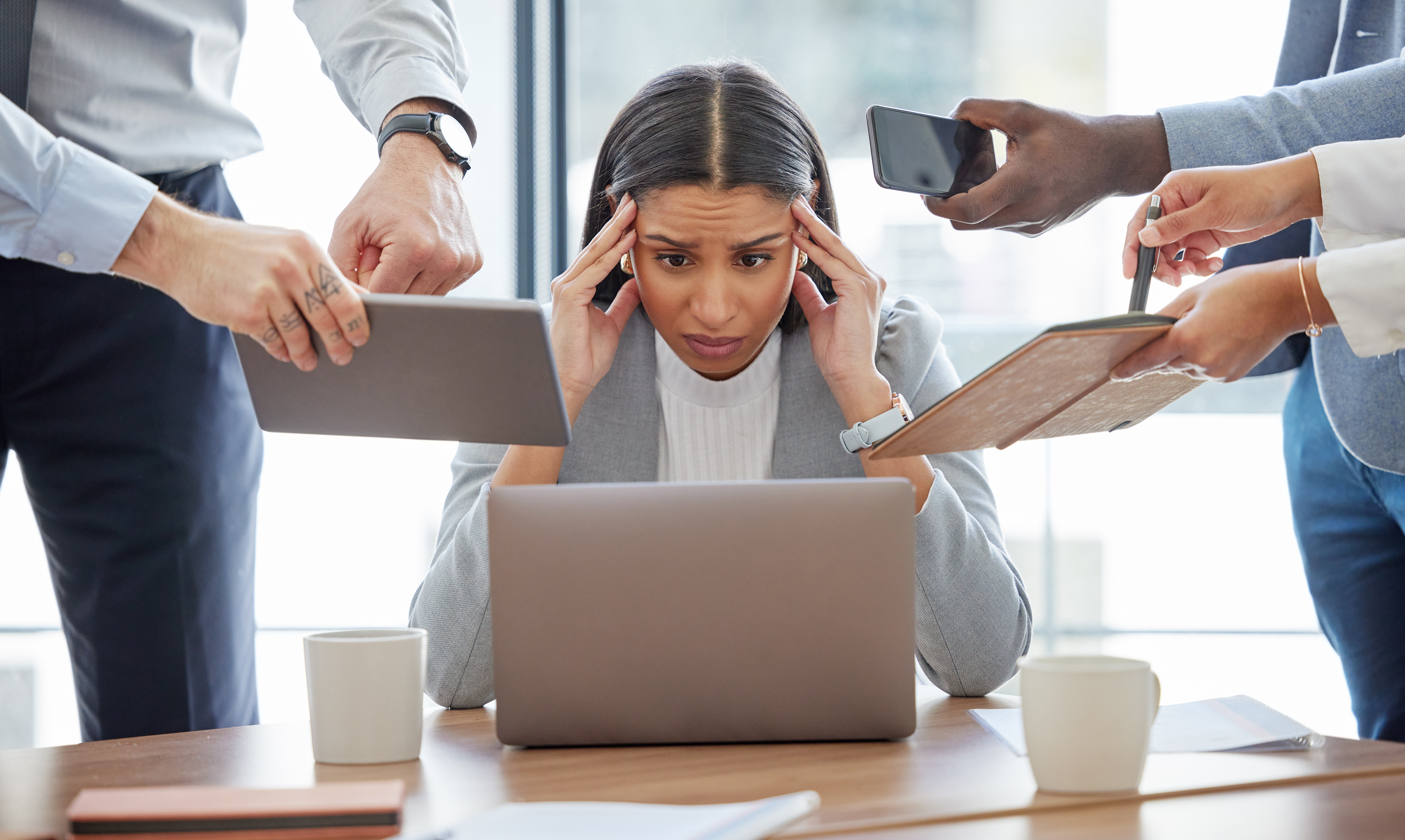 Overwhelmed employee juggling work and family responsibilities while missing a court date 