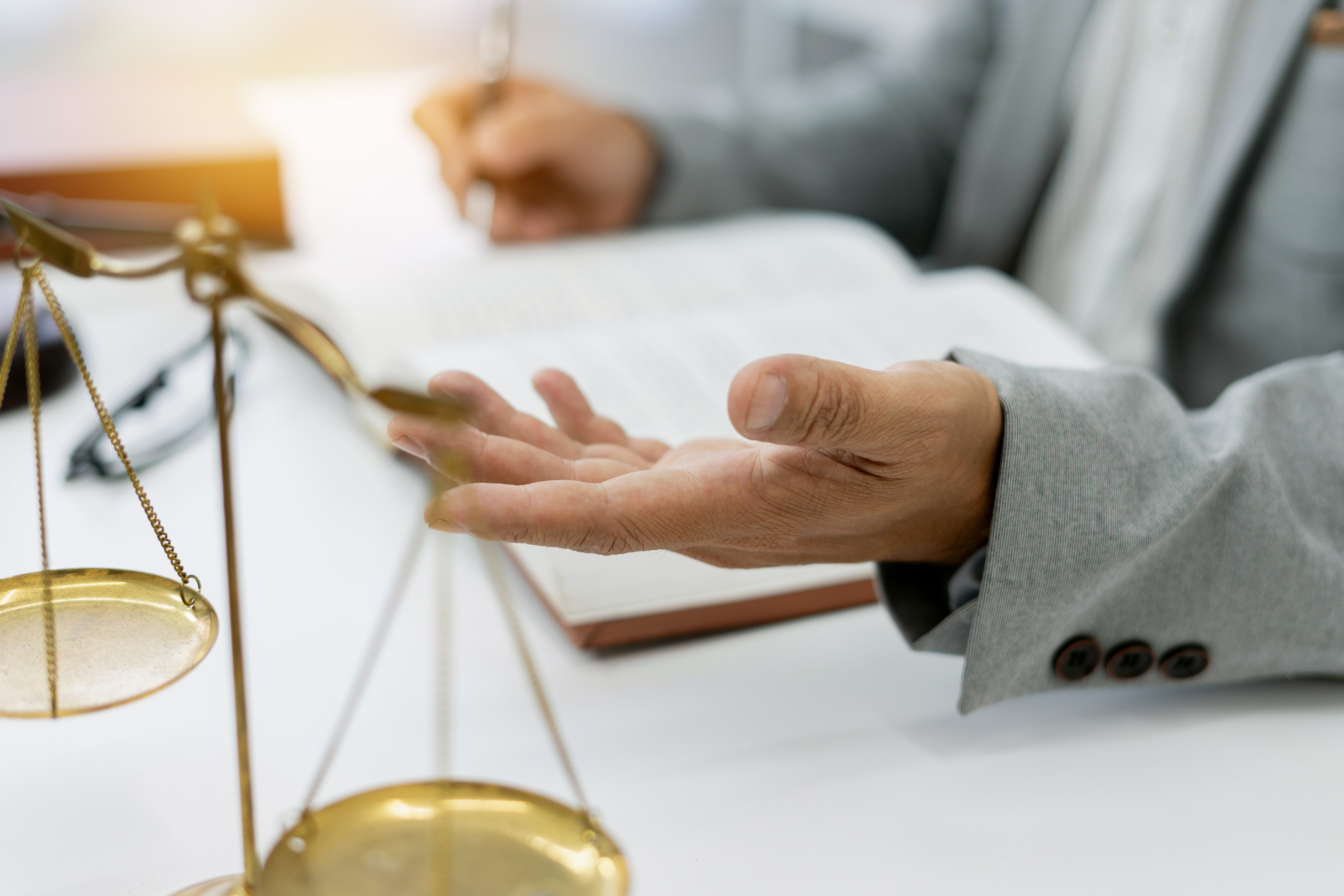 Nervous employee giving deposition testimony during workplace case 