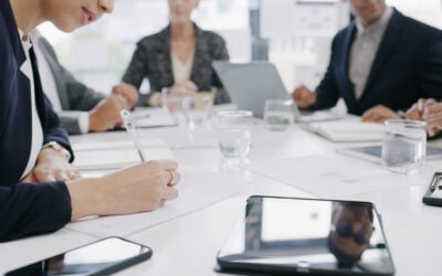 Employee reviewing a termination letter, court papers, and employment records after being fired without a clear reason.