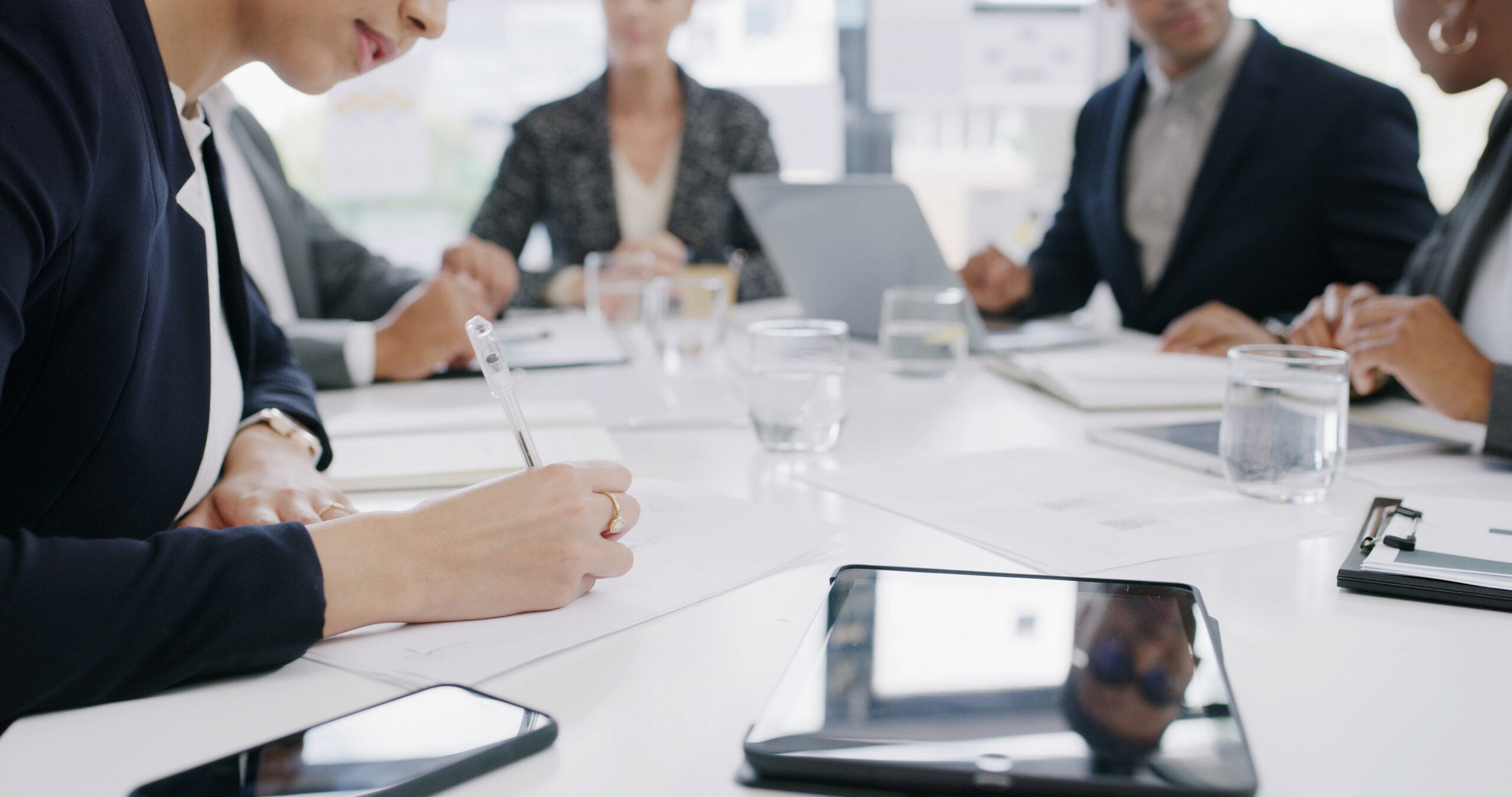 Employee reviewing a termination letter, court papers, and employment records after being fired without a clear reason.