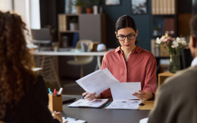 Employee reviewing intermittent FMLA paperwork, medical leave approval, call-in rules, and return-to-work instructions.
