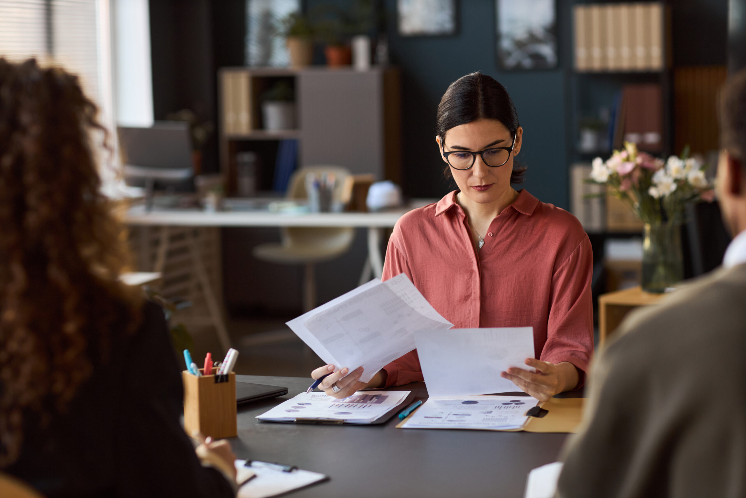 Employee reviewing intermittent FMLA paperwork, medical leave approval, call-in rules, and return-to-work instructions.