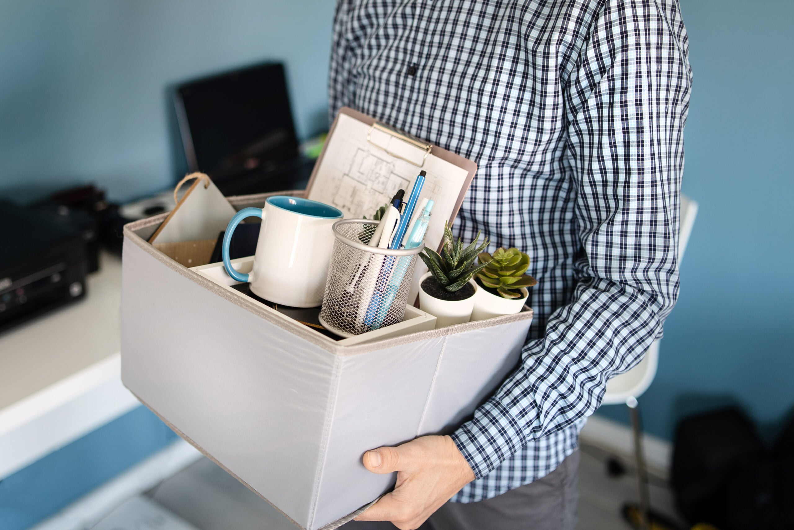 Employee reviewing termination notice, disability discrimination paperwork, EEOC charge deadline, and statute of limitations calendar. 