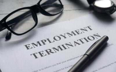 Wrongfully fired employee reviewing court papers without an employment lawyer.