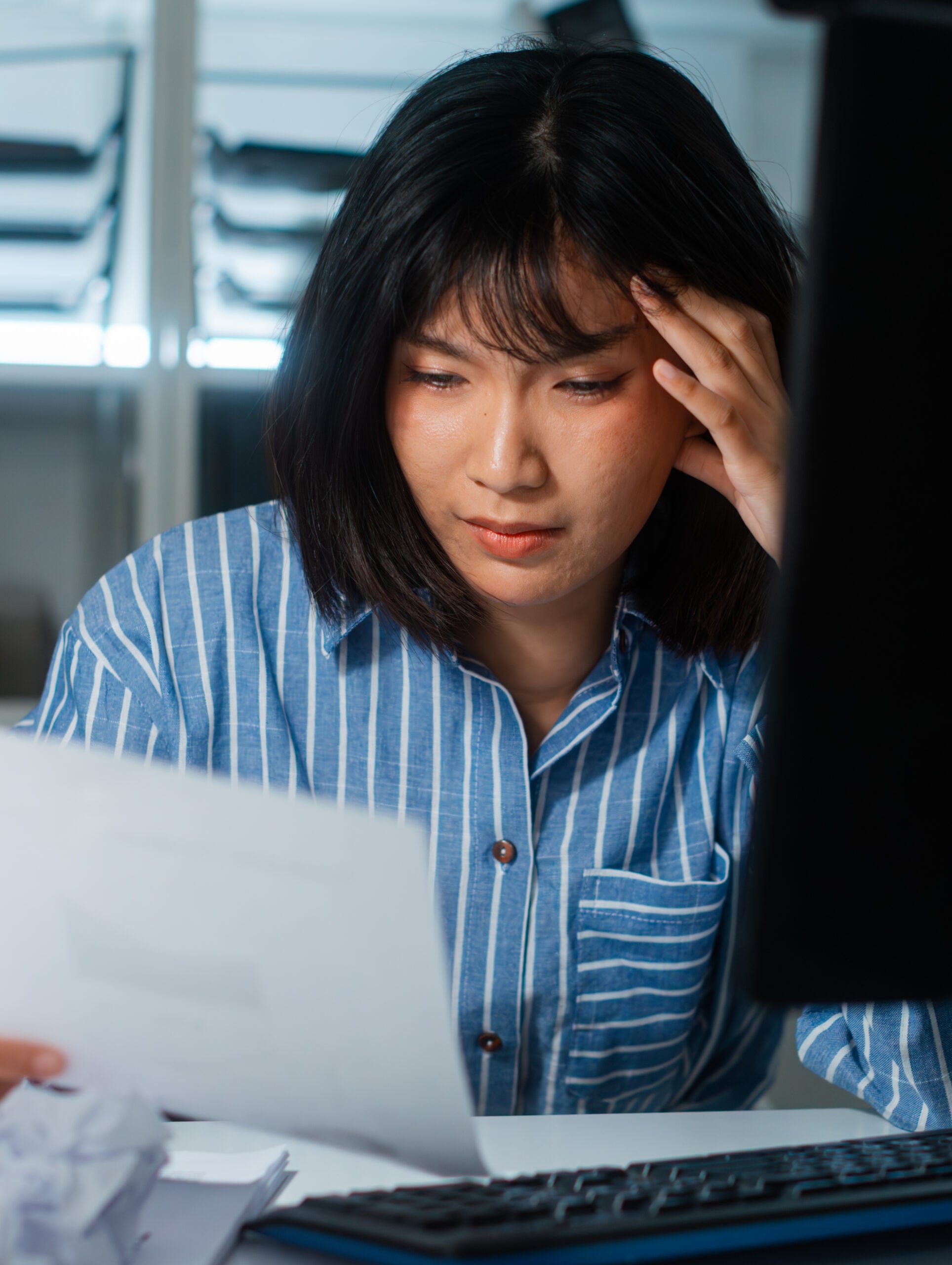 Employee reviewing FMLA leave, disability accommodation, performance write-ups, and termination records after being wrongfully fired
